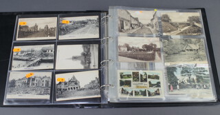 A red ring bound album of First World War and later black and white postcards, some local scenes 