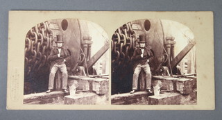 Isambard Kingdom Brunel, a stereoscopic slide by Robert Howlett and George Downes. The arched photos featuring Brunel seated by the launching chains of the SS Great Eastern (then named The Leviathan).  The card impressed bottom left The London Stereoscopic Company, the reverse with pink label marked "THE LEVIATHAN, STEAM SHIP" (handwritten "Mr Brunel" beneath) 84mm x 174mm
