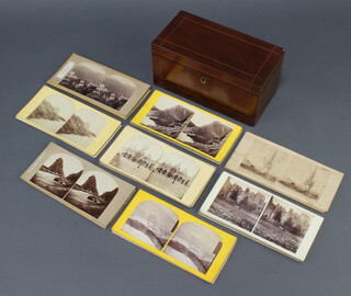39 various stereoscopic slides including 12 scenes of Devon, 3 of Edinburgh, 14 Churches, Abbey's and Cathedrals, The Basilic of St Mark - Venice, 3 A Braun A Dornach cards, no's 795, 1040 & 1095, 2 different views of the Clam Shell cave Staffa and 4 others including a view of Brighton and The Ghost in the Stereoscope contained in an inlaid mahogany box with hinged lid 