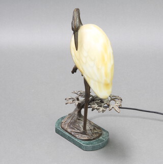 A bronze and glass table lamp in the form of a stork raised on an oval marble base, base marked 1996 Tinchi 43cm h x 18cm x 11cm 