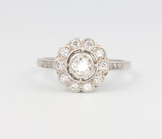A platinum diamond cluster ring approx. 0.7ct, size N 1/2, 4.8 grams