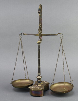 A pair of brass apothecary scales complete with weights 40cm x 31cm x 13cm d 