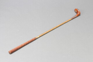 The Laird, a hickory shafted golf driver, head marked The Laird, Handmade in St Andrews by Golf Classics 