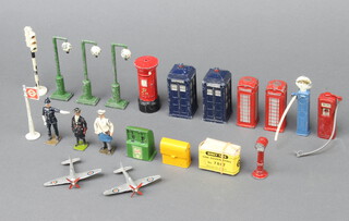 Two Dinky Police boxes and two phone boxes etc