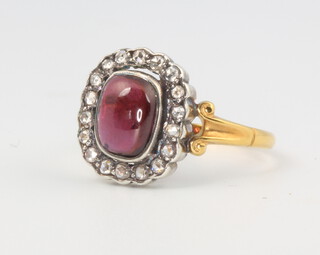 A15ct yellow gold cabochon garnet and diamond ring in the Victorian style 2.8 grams, size O 