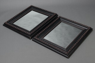 A pair of rectangular bevelled plate mirrors contained in cushion shaped frames 71cm h x 61cm w (some damage to corners) 
