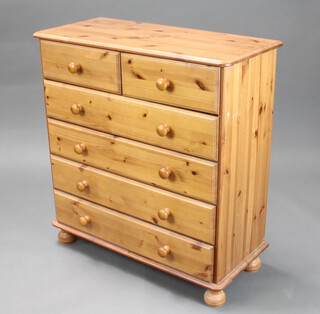 A Victorian style pine chest of 2 short and 4 long drawers on bun feet 88cm h x 82cm w x 38cm d 