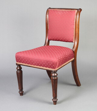 A William IV mahogany show frame dining chair, seat and back upholstered in red material, on turned and fluted supports 84cm h x 50cm w x 49cm d (seat 38cm x 38cm, frame loose)