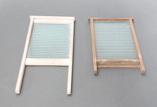 A pine and glass washboard 62cm x 30cm x 3cm together with 1 other 48cm h x 33cm w (signs of old but treated worm) 