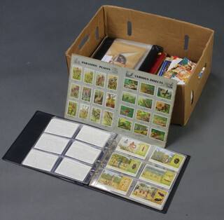 A collection of ephemera relating to the Westfield development and various cigarette cards 