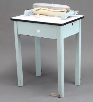 A 1940's pine turquoise painted and enamelled laundry table, the top complete with wringer 77cm h x 64cm w x 46cm d 