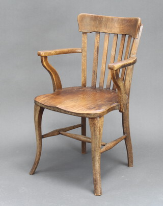 An Edwardian beech framed stick and rail back office armchair with solid seat and H framed stretcher, raised on cabriole supports 86cm h x 56cm w x 57cm d (seat 36cm x 38cm)
