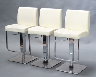 Three adjustable chrome and leatherette stools, raised on square bases 86cm h x 40cm w x 43cm d 