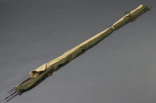 A Canadian vintage 9' fibreglass trout fishing rod and 1 other (in 2 bags) 
