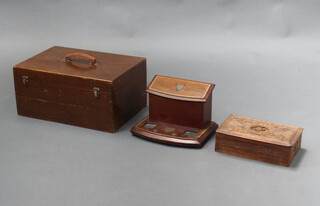 A carved wooden trinket box with hinged lid 8cm x 28cm x 18cm and an inlaid mahogany bow front standish the back incorporating a stationery box (inkwell missing) 20cm x 30cm x 22cm  