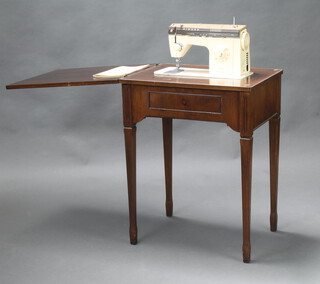 A Singer 7108 electric sewing machine contained in a mahogany table raised on square tapered supports 80cm h x 60cm w x 45cm d