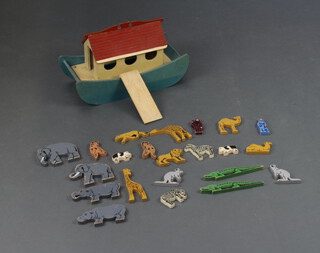 A Tiger Toys model Noah's Arc comprising arc, Noah, Naamah, 2 elephants, 2 hippos, 2 monkeys, 2 kangaroos, 2 giraffes, 2 crocodiles, 2 camels, 2 pigs, 2 lions and 2 zebras 23cm h x 42cm l x 19cm w 