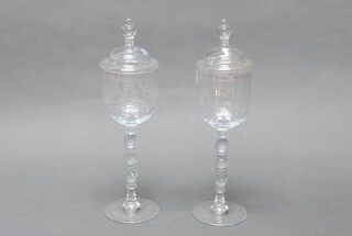 A pair of Austrian Belvedere glass cups and covers decorated with flowers 30cm, with original boxes  