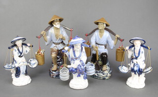Two modern Chinese figures of water carriers 32cm and 3 other figures