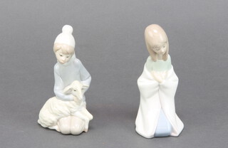 A Lladro figure of a kneeling girl 15cm together with a ditto of a boy shepherd 14cm 