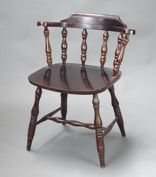 An elm tub back carver chair with bobbin turning and solid seat raised on turned supports with H framed stretcher  76cm h x 62cm w x 44cm d (seat 37 x 37cm) 