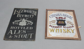 A pub glass panel marked Isleworth Brewery bottled ales and stouts 73cm x 43cm (some paint loss) together with a reproduction pub mirror for Chivas Regal Blended Scotch Whisky 67cm x 50cm 