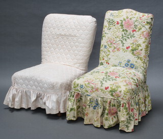 Two nursing chairs raised on turned supports 