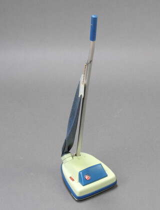 A child's C.M.T Wells Kelo model of a Hoover Junior upright vacuum cleaner (Hoover logo to front is damaged)