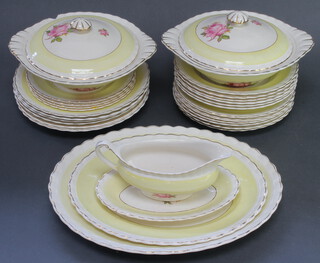 A service of J & G Meakin floral decorated dinnerware