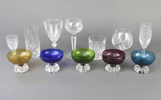 A quantity of cut glass tableware comprising 4 brandy glasses, 6 large wines, 8 tumblers and minor glassware 