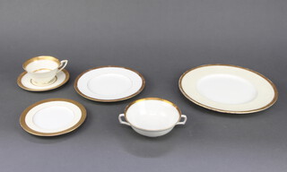 A matched tea and dinner service with gilt decoration by Mintons and Royal Worcester comprising tea cups, saucers, 2 handled bowls, small plates, serving plates, hors d'oeuvres dishes (only a sample photographed) 