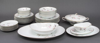 A Noritake china Arden pattern part dinner service comprising side plates, dinner plates, dishes, serving dishes, tureen and sauce boat 