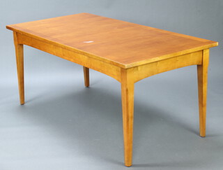 A cherry dining table raised on square tapered supports 79cm h x 179cm l x 90cm w (ring mark and water mark to the top) 