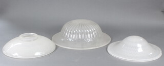 A glass ceiling light and other light fittings 