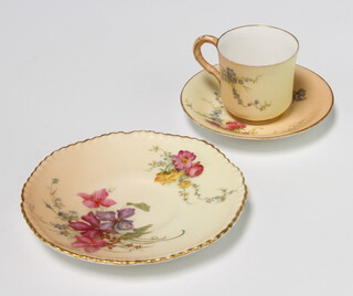 A Royal Worcester blush porcelain teacup and saucer decorated with flowers together with a ditto saucer (all have slight wear to the gilding and contact marks)