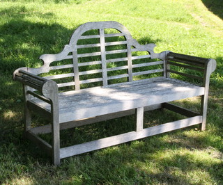 Alexander Rose, a well weathered Lutyens style wooden slatted garden bench 108cm h x 183cm w x 57cm d (seat 152cm x 45cm)  