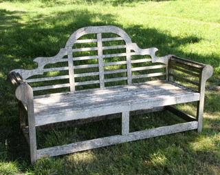 Alexander Rose, a well weathered Lutyens style wooden slatted garden bench 108cm h x 183cm w x 57cm d (seat 152cm x 45cm)