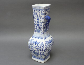 A Chinese squared oviform vase with drop handles decorated with bats amongst flowers 45cm 