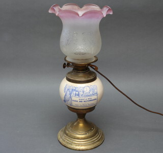 A ceramic table lamp with brass mounts and pink glass shade (no chimney) converted to electricity 49cm 
