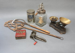 A butter churn, a pair of pan scales and other domestic items 