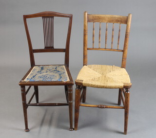 A Victorian beech stick and rail back bedroom chair with woven rush seat and bobbin turned decoration together with an Edwardian arch shaped inlaid mahogany bedroom chair upholstered seat
