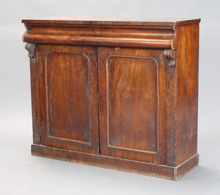 A Victorian mahogany chiffonier base fitted a secret drawer above arched panelled doors, raised on a platform base 91cm h x 107cm w x 38cm d (timber let in to the top water stains in places, moulding missing to left hand door)