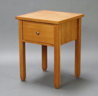 A light hardwood lamp/bedside table fitted a drawer, raised on square tapered supports 63cm h x 48cm w x 45cm d (ring mark to the top)