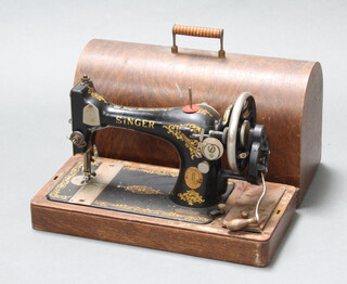 A Singer manual sewing machine no. Y3756117 with carrying case (no key) 