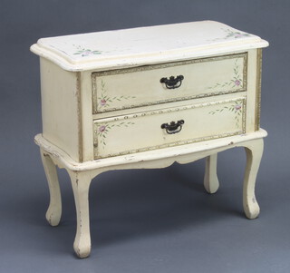 A white and floral painted chest of serpentine outline fitted 2 long drawers, raised on cabriole supports 72cm h x 79cm w x 42cm d 