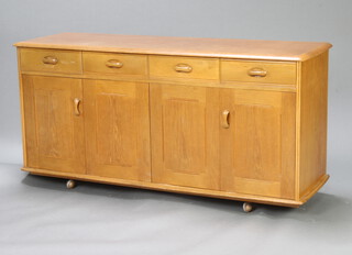 An Ercol style light elm sideboard fitted 4 drawers above double cupboard enclosed by sliding doors, raised on shepherd casters 76cm h x 158cm w x 48cm d (ring marks and water stains to the top) 