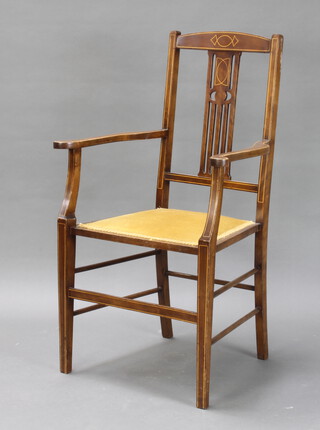An Edwardian inlaid mahogany open armchair, seat upholstered in yellow material 