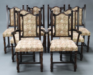A set of 8 high back dining chairs, seats and backs upholstered in tapestry material, raised on turned and block supports - 2 carvers, 6 standard 98cm h x 43cm w x 45cm d (seat 36cm w x 36cm d) 