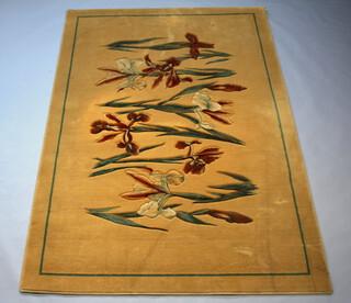 A Ryalux, The V&A Art Nouveau Rug Collection, machine made peach ground rug decorated iris 240cm x 171cm  