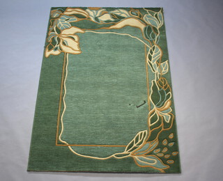A Ryalux, The V&A Art Nouveau Rug Collection, machine made green ground rug decorated buttercups 189cm x 141cm  
